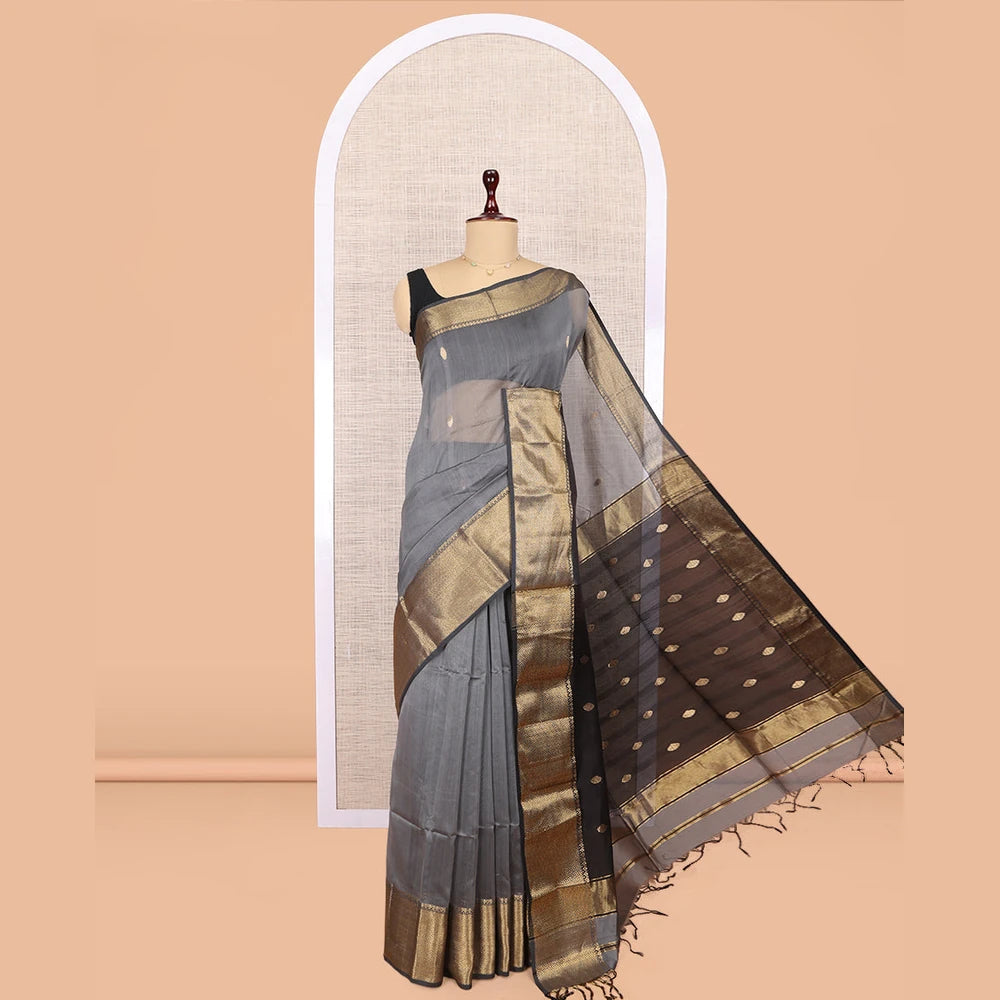 Pothys Grey Maheshwari Cotton Saree, Adorned with Buttas, Highlighted by a Traditional Zari Border, Pallu Gleamed Up with Zari Buttas, and a Contrast Blouse